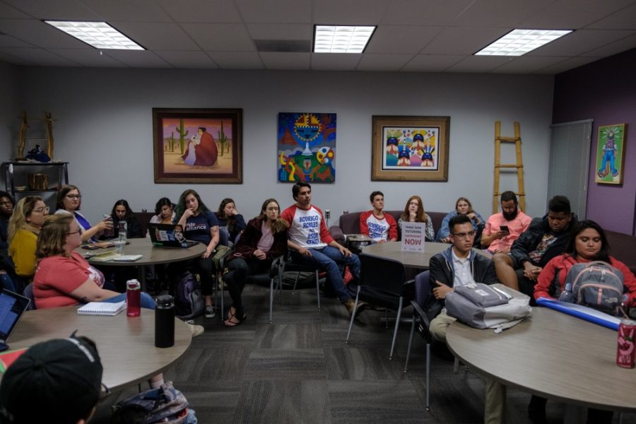 Students wait to ask questions to University of Arizona executive board candidates on Mar. 13 in Tucson, Ariz.
