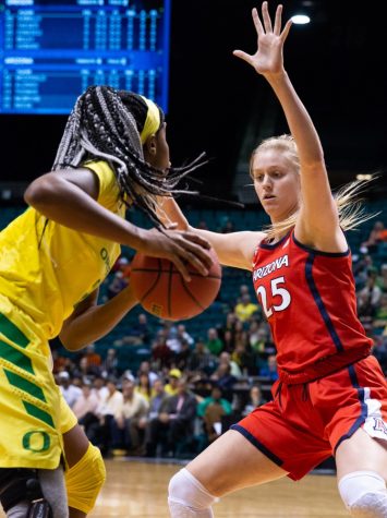 Cate Reese (25) tries to block on Oregon player from passing the ball during the second round of the Pac-12 tournament on Friday, March 8 at the Grand Garden Arena in Las Vegas, Nevada. Arizona was beaten by Oregon 77-63.