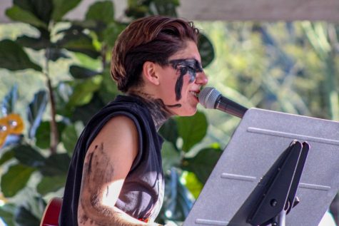 Lead vocalist and ukulele player, Anastasia Lopez, of band "Tonight's Sunshine" performing at the main stage for 4th Ave Street Fair attendees on March 23, 2019. The band performed original and cover songs throughout their set.