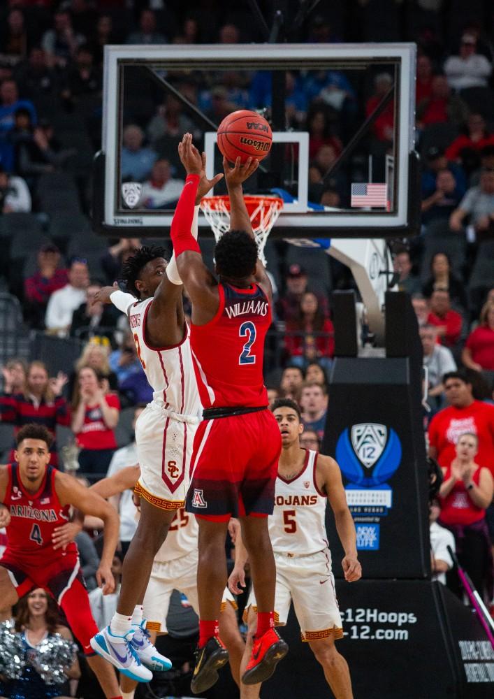 Arizona freshman Brandon Williams (2) shots the ball at he three point line during the second half on the PAC-12 USC-Arizona game on March 13, 2019. The Wildcats lost to the Trojans 78-65.
