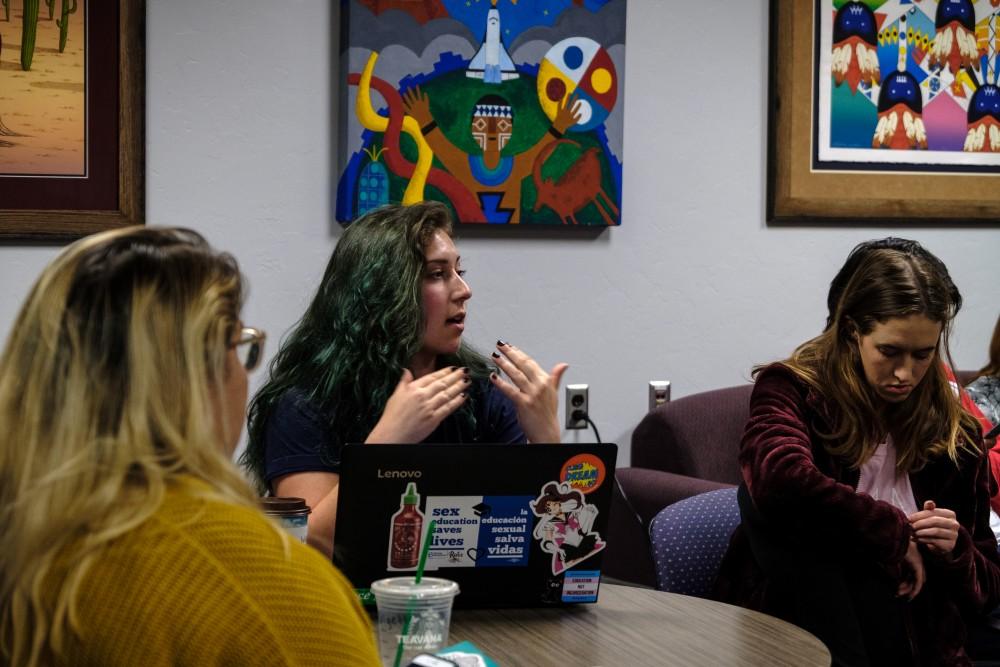 Lexy Reyelts, the co-director of the university's Pride Alliance, questions hopeful student government leaders questions on Mar. 13 in Tucson, Ariz.