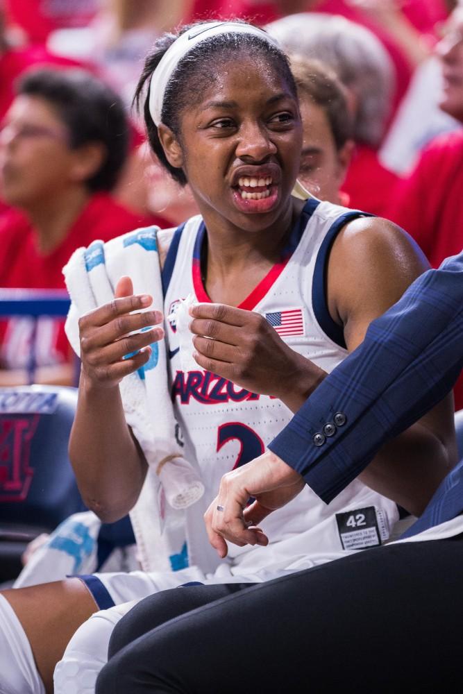 Aari McDonald (2) grimaces on the bench after she takes a hard screen to the body in the second half of play vs Idaho on Thursday, March 28th. [Beau Leone/The Daily Wildcat]