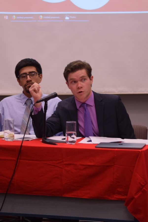 Finley Dutton-Reid and Juan Torres, members of the University of Arizona Debate Series, during the debate on April 9. The debate covered whether community college should be tuition free. 

