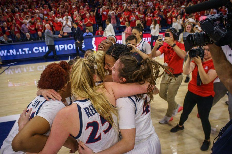 University of Arizona's women's basketball team celebrates after winning the WNIT championship on Apr. 6 in Tucson, Ariz.