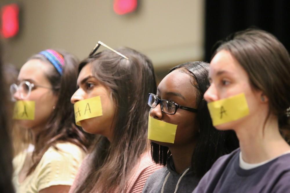 Students and other members of the campus community gathered on April 11 to protest at the Arizona Board of Regents meeting regarding the students who are being criminally charged after an incident with Border Patrol on March 19. Many of the protesters wore tape over their mouths to illustrate a silent protestor in coalition for the "Arizona 3."