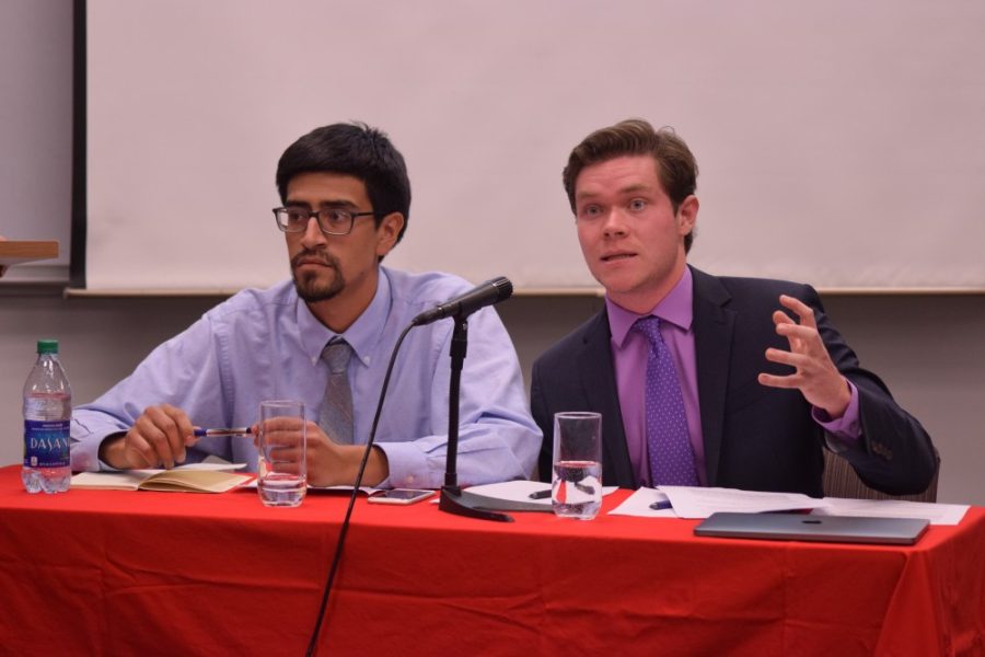 Finley Dutton-Reid and Juan Torres, members of the University of Arizona Debate Series, during the debate on April 9, covering whether community college should be tuition free. The debate series is hosted by the College of Social and Behavioral Sciences.

