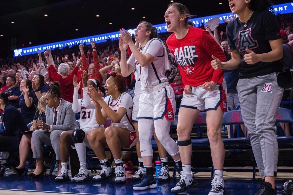 Arizona's bench gets hyped after a crucial play late in the second half of play in the WNIT semifinal game on Wednesday evening. 