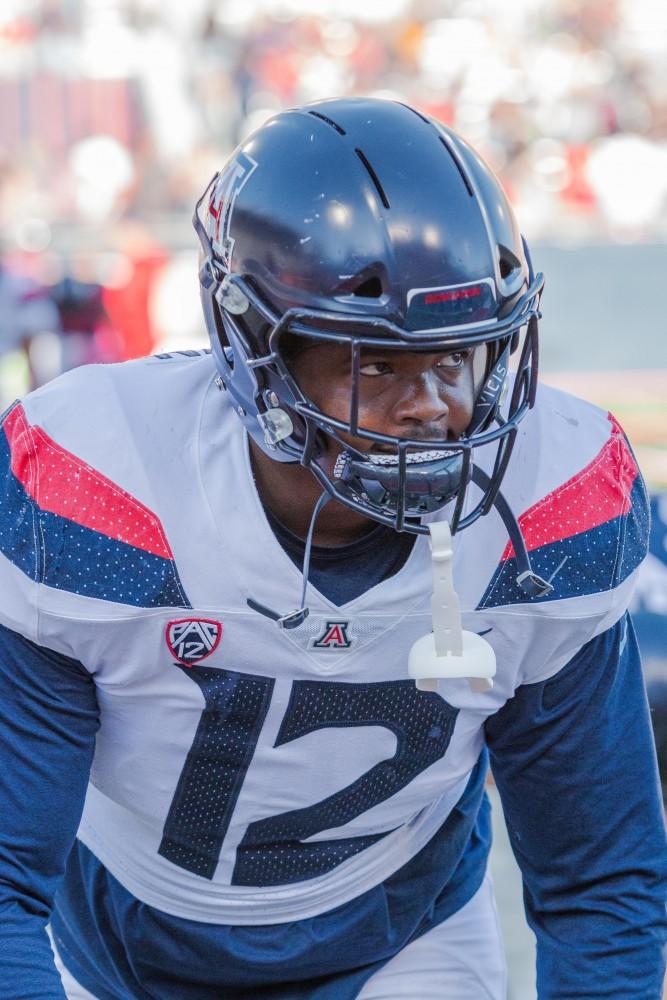 Photo by Beau Leone. Junior JB Brown (12) warms up pregame before the University of Arizona Spring Game.