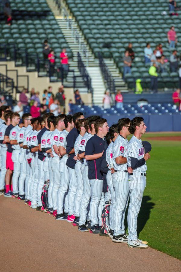 Arizonas baseball stands for the national anthem before their game against New Mexico State on Apr. 30 in Tucson, Ariz.