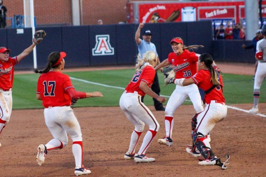The Arizona softball team celebrates after beating Ole Miss 9-1 to advance to the Womens College World Series.