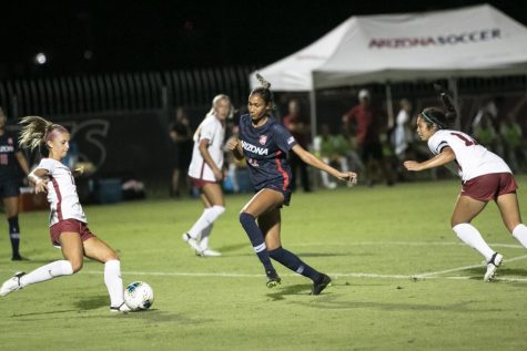 Forward Jada Talley (#22 Junior) playing some defense as she goes for a block against Oklahoma on Friday, Sept 6 at Mulcahy Stadium. She assisted Leah Carillo (#25 Senior) in her first career goal.