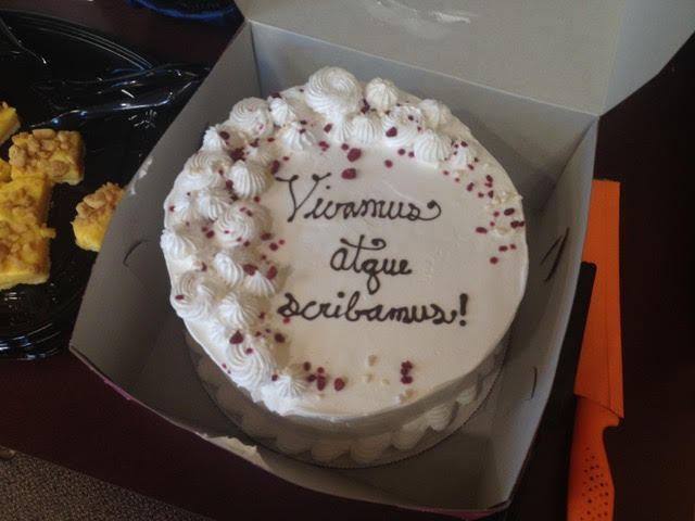 The words on the cake at the first "Composing Latin Poetry" club meeting on Sept. 17 read "Vivamus atque scribamus," which translates to, "Let us live and let us write."