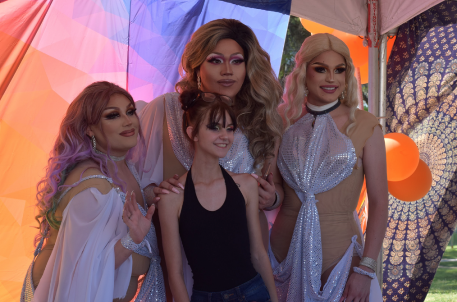  Drag queens posing with a pride attendee at the 2019 Tucson Pride festival. Tucson Pride was founded in 1977, making this the 42-annual festival.