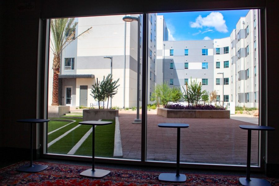 The fully enclosed Honors Village courtyard is designed to always have a shady area, no matter where the sun is. The courtyard has tables for outdoor dining and study areas. 