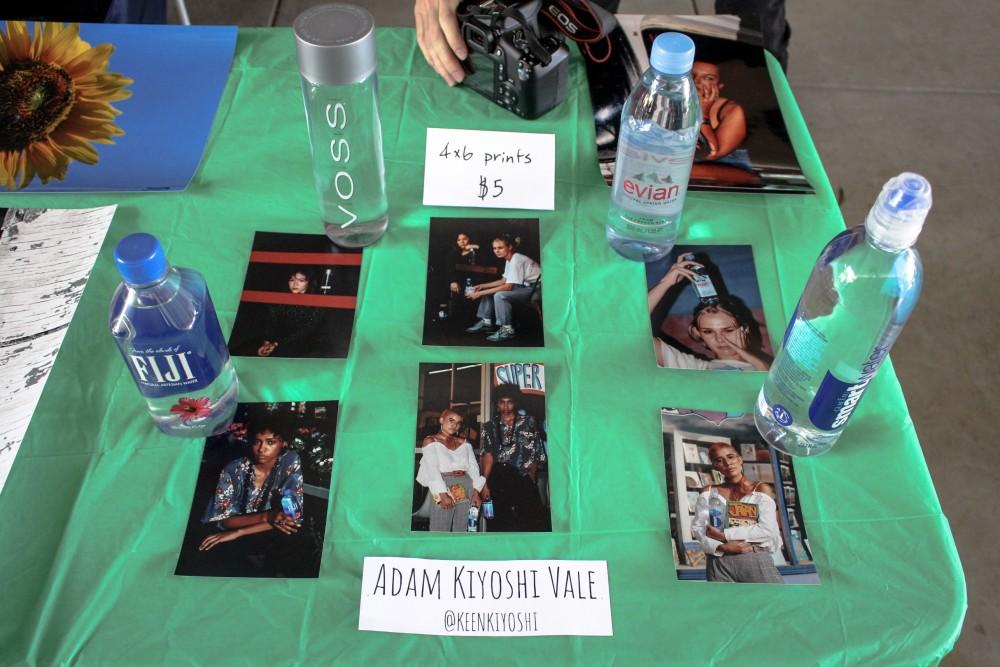 An artist feautured in the is Carnegiea Literary Magazine is Adam Kiyoshi Vale (@keenkiyoshi). He displays his "water models" display which features models coordinating outfits with the water bottle brands. 