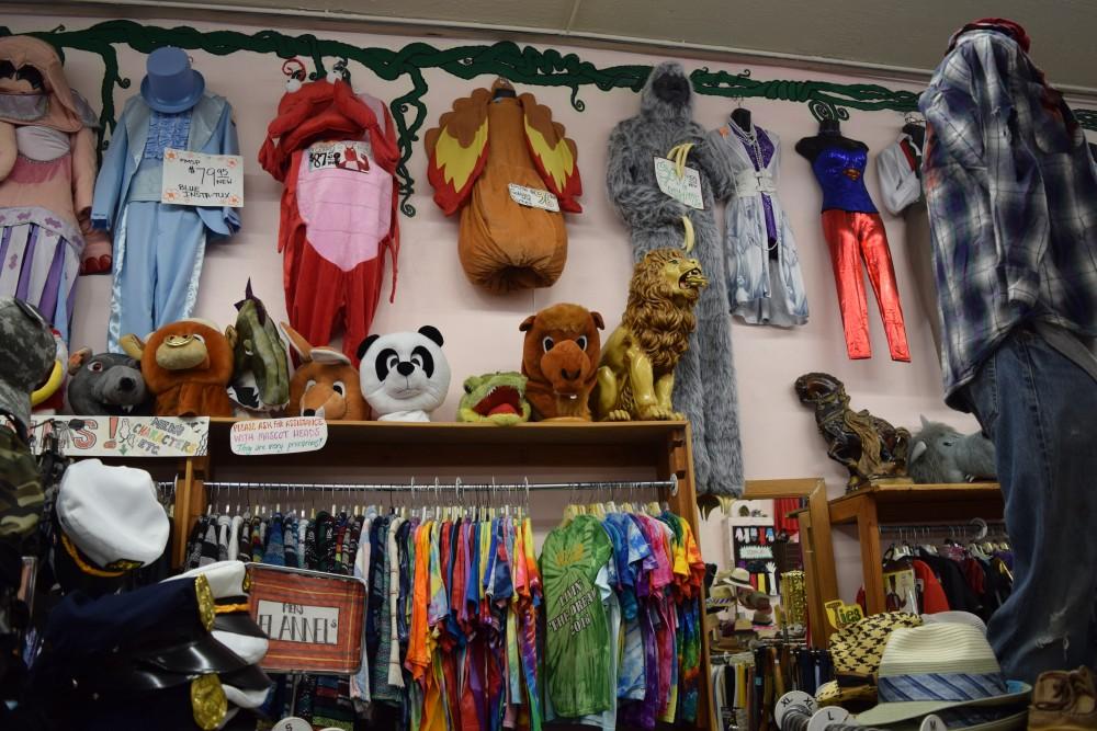 Various Halloween costumes in display in Tucson Thrift Shop on Fourth Avenue in Downtown Tucson. Tucson Thrift Shop is advertised as Tucson’s Halloween costume destination.
