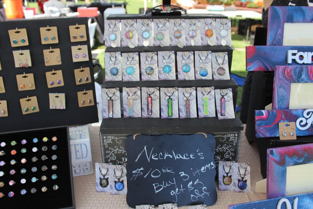 Hot Mess Mama's Art has necklaces, earrings, rings, and picture frames.