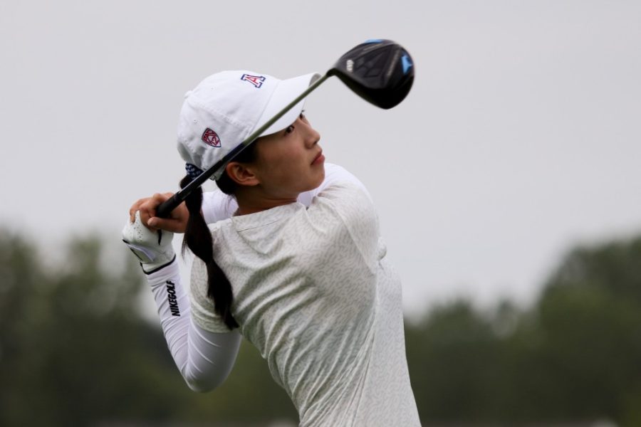 Vivian+Hou+watches+the+ball+after+she+successfully+drives+it+down+the+green+during+the+ANNIKA+Intercollegiate+practice+round.