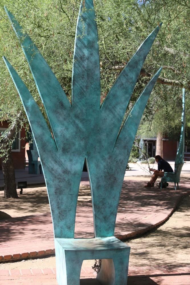 One of the several chairs located in front of the University of Arizona Art Museum and the Gallagher Theater.