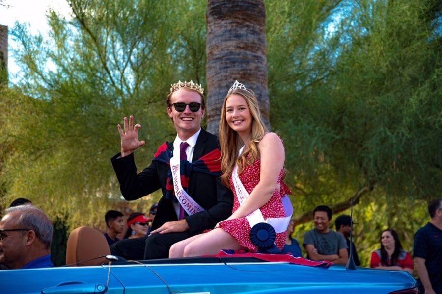 Homecoming+King+Hunter+Lindgren+and+Homecoming+Queen+Brigid+Clark+riding+in+the+Homecoming+Parade+on+Nov.+2%2C+2019.