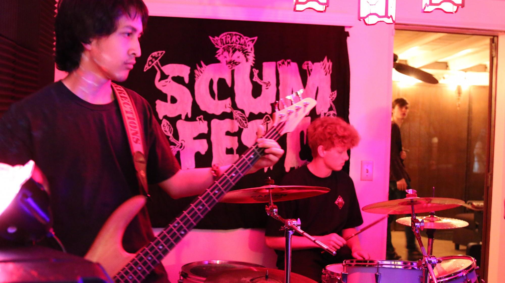 Reuben Matias, left, and Johnny King, right, play with their band Zenny Cake at Scum Fest. The event was held on Nov. 16 to raise money for a new music venue.