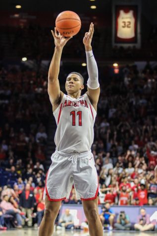 Ira Lee (11) shoots a free-throw shot after being fouled during the second period of the Arizona- Illinois game.