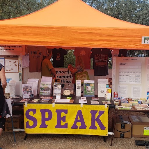 A booth at the Vegan Festival, sells speak books and t-shirts. 