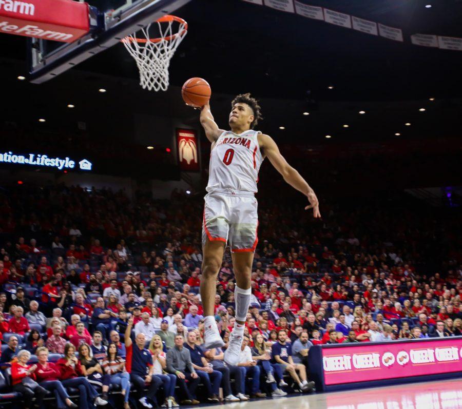 Wildcat Josh Green (0) jumps up towards the basket to score another point during the  Arizona-Chico State game at the McKale Center on Friday November 1 in Tucson. Arizona defeated Chico State 74-65.