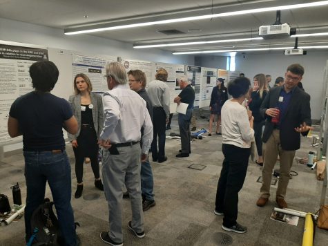 UBRP students present their research on posters to attendees of the conference on Jan. 25 in the ENR2 building. The conference publicly showcased the students' biology research.