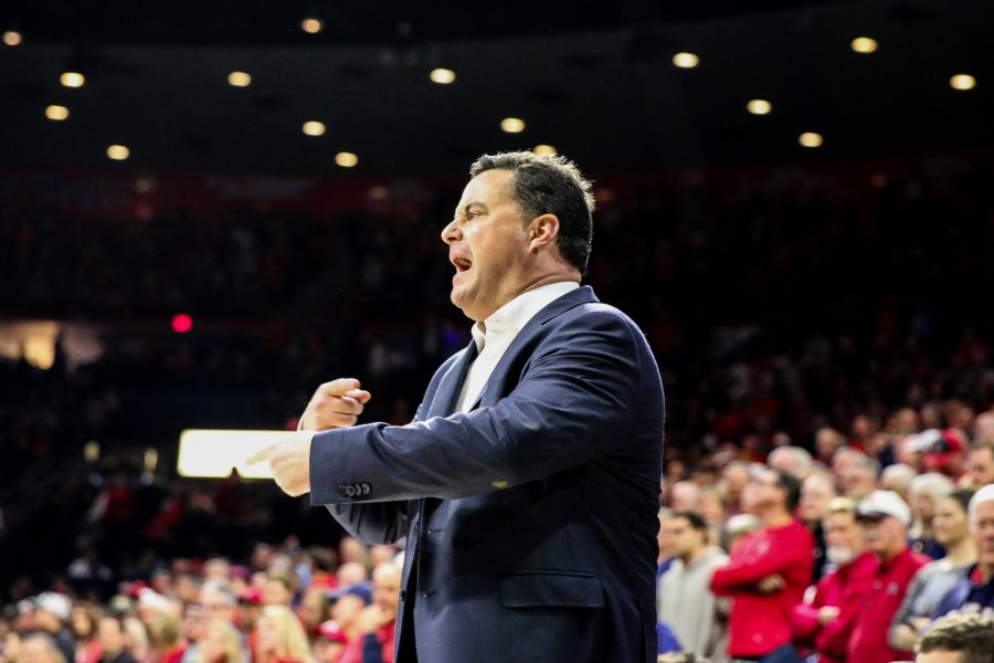 Arizona Mens Basketball coach Sean Miller, yells at the referee after disagreeing with their decision not to call a technical violation. 