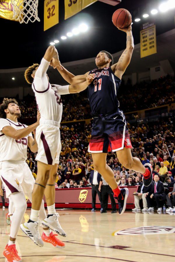 Ira Lee (11) goes up for a dunk against the Sun Devils. 
