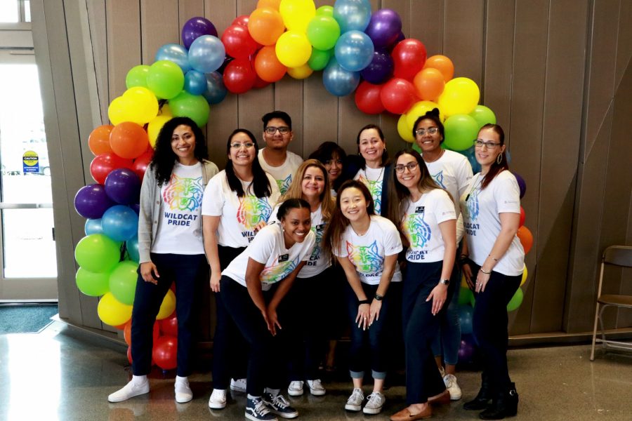 Members of University of Arizona Health Services Office of Diversity and Inclusion, pose for a group picture at the Second Annual UAHS LGBTQ and National Symposium Community Health Fair in Tucson, Ariz., Saturday, Feb. 22, 2020. 

