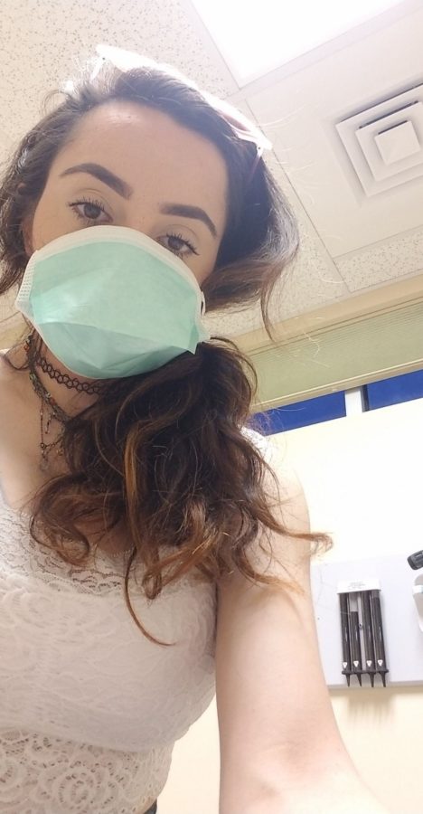 Lauren Salgado, student of the School of Journalism, takes selfie at doctors office while waiting to be tested for COVID-19 in Tucson, Ariz. Wednesday, March 18, 2020.