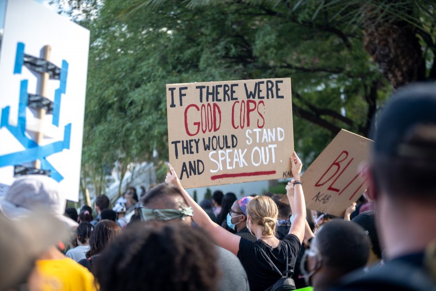 Photograph of a sign held by a local Tucson protester for the Black Lives Matter Movement.