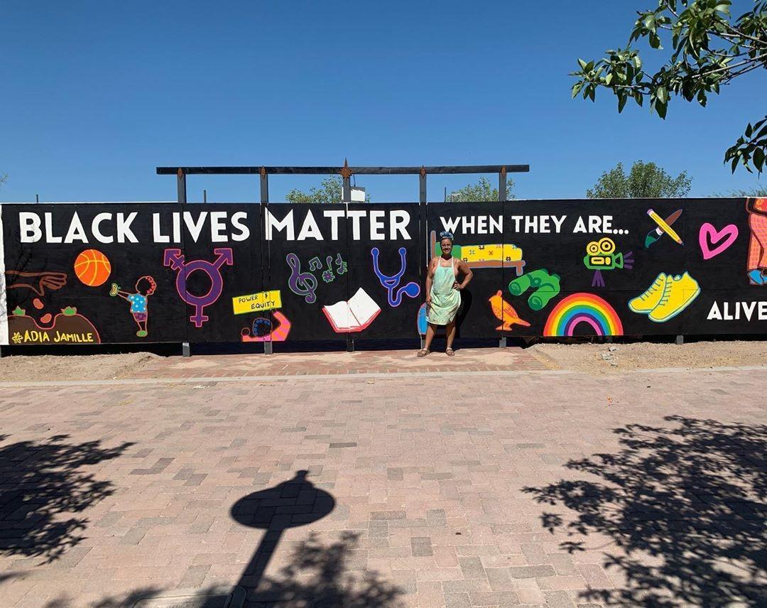 Adia Jamille stands by her mural near MSA Annex. (Photo courtesy Adia Jamille)