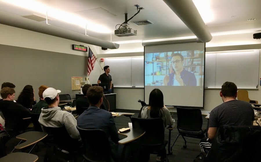  UA Tamid gathers at their normal meeting spot in Eller to watch a video on Israeli startups. (Courtesy Rachel Greenberg)