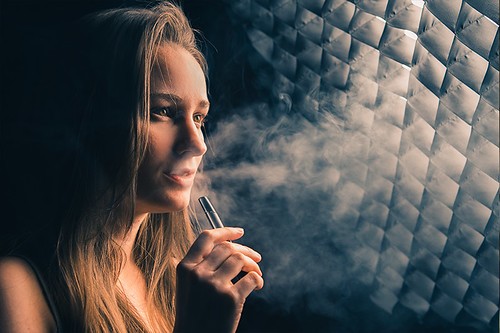 Woman Vaping on Electronic Cigarette by Vaping360 is licensed under CC BY 2.0. To view a copy of this license, visit https://creativecommons.org/licenses/by/2.0/