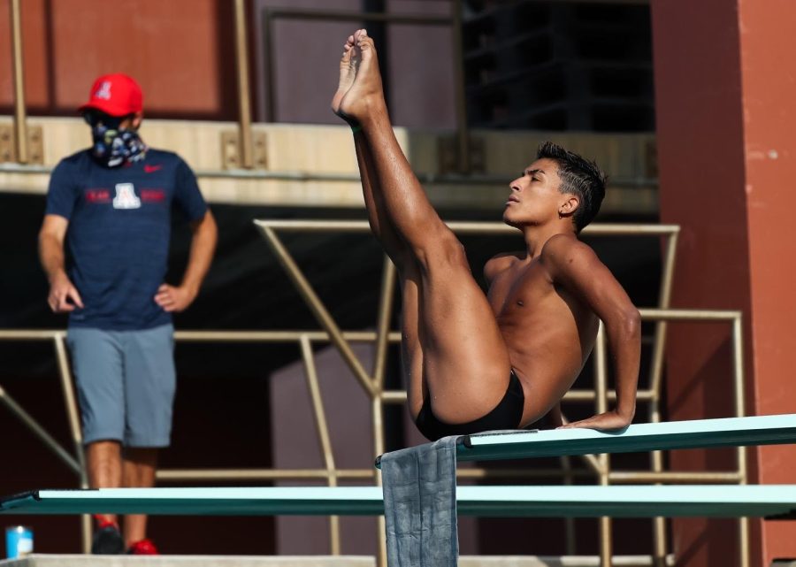 Eric Correa practices at the Hillenbrand Aquatic Center on the University of Arizona on Sept. 16, 2020. Dwight Dumais coaches Correa. (Photograph by Mike Christy)  