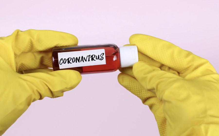 On Dec. 15, the U.S. Food and Drug Administration issued an emergency use authorization of the first at-home, prescription-free coronavirus test from Ellume Health. That same day, the country reported nearly 3,000 deaths from the virus. Hands in yellow rubber gloves holding Coronavirus test tube by wuestenigel is licensed with CC BY 2.0.