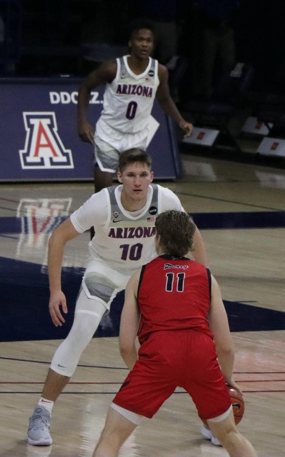 Azuolas Tubelis, a freshman on the University of Arizona’s men’s basketball team, plays defense against an Eastern Washington player in McKale Center on Saturday, Dec. 5, 2020. 