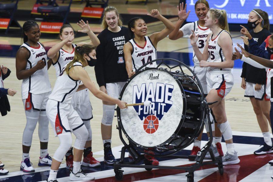 Arizona guard Helena Pueyo bangs the celebratory drum after their 67-51 win over Oregon State on Sunday, Jan. 17, 2021, in McKale Center. (Courtesy of Mike Christy/Arizona Athletics) 