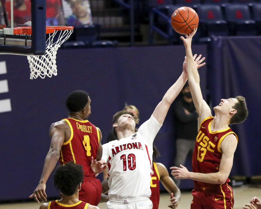 Arizona Wildcats Azuolas Tubelis attempts to block USCs Drew Petersons shot attempt on Thursday, Jan. 6, 2020 in Tucson, Arizona in the McKale Center. The Wildcats would lose the game 87-73. (Courtesy of Mike Christy/Arizona Athletics)