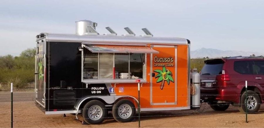 The owner of Cucusas Caribbean Cuisine Dayami Expositos bright orange food truck was parked and open for business. Courtesy Exposito