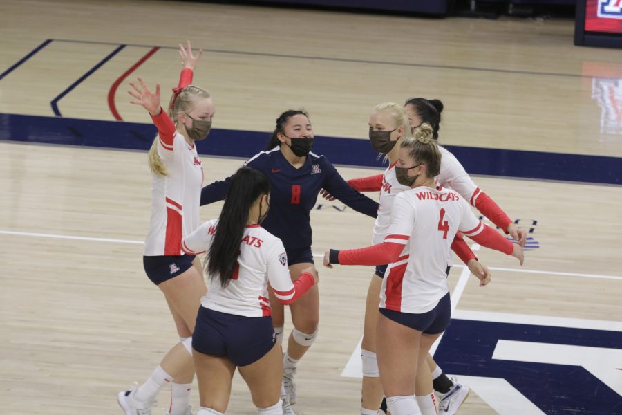 The Arizona women’s volleyball team rejoices after winning a point during a game on Sunday, March 14, 2021. The Wildcats were victorious over the Colorado Buffalo by winning 3 out of 4 games. 
