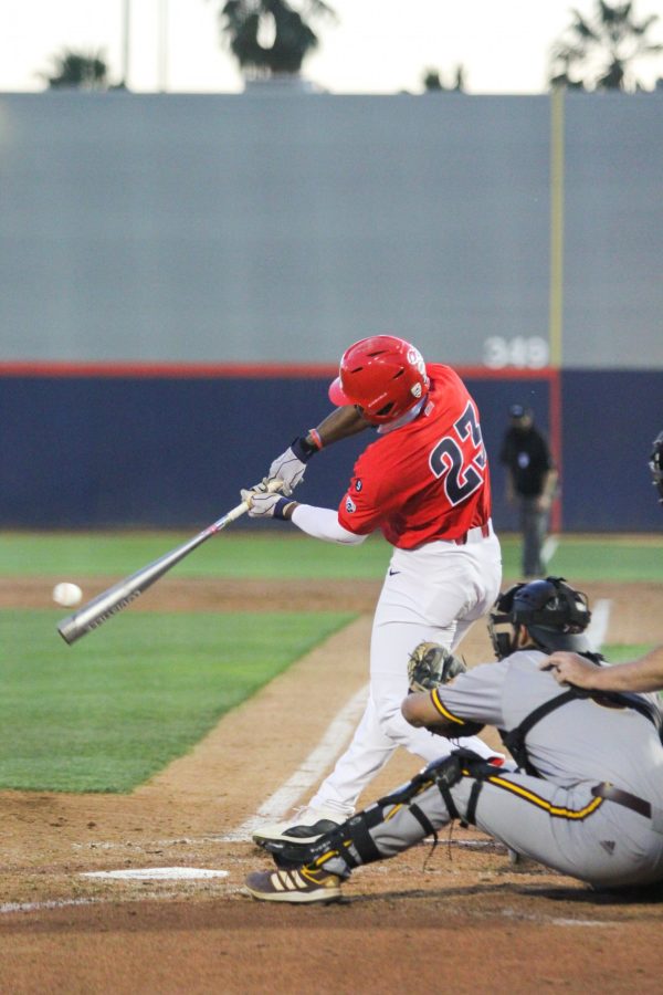 Donta Williams bats against Arizona State. The Wildcats defeated the Sun Devils 14-2 on Tuesday, April 6 at Hi Corbett Field.