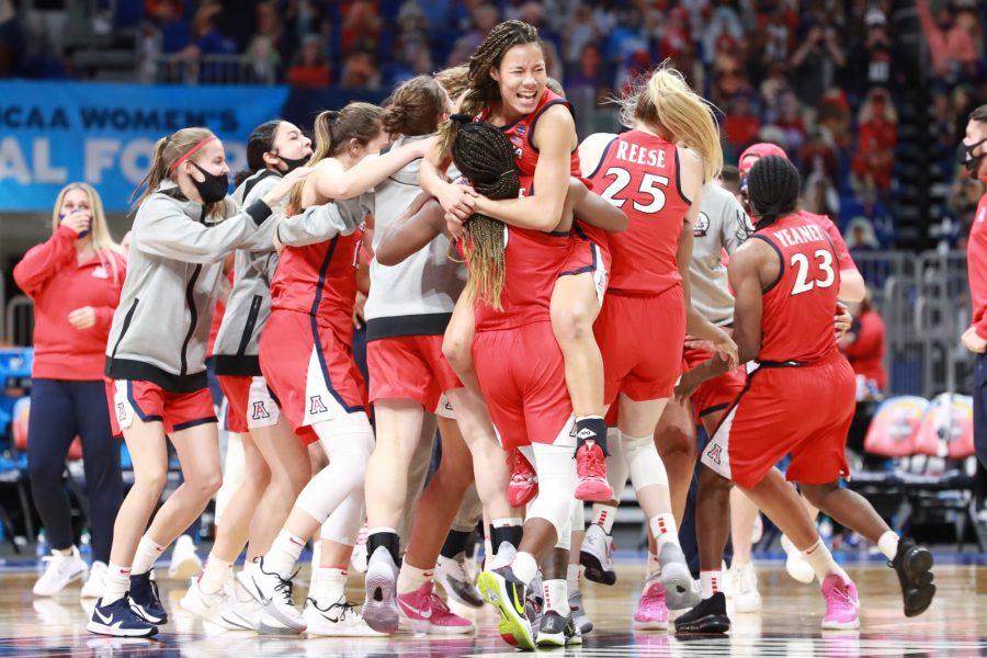SAN ANTONIO, TX - APRIL 2: Arizona Wildcats Players celebrate their win over the Connecticut Huskies in the semifinals of the NCAA Women’s Basketball Tournament at Alamodome on April 2, 2021 in San Antonio, Texas. (Photo by Justin Tafoya)
