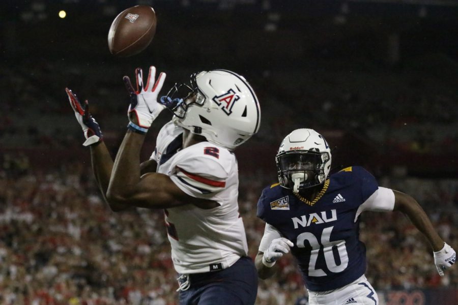 Arizona wide receiver, Boobie Curry, catches a pass from quarterback Will Plummer in Arizona Stadium on Sept. 18. Curry finished the game with two touchdown receptions and 55 yards receiving. 