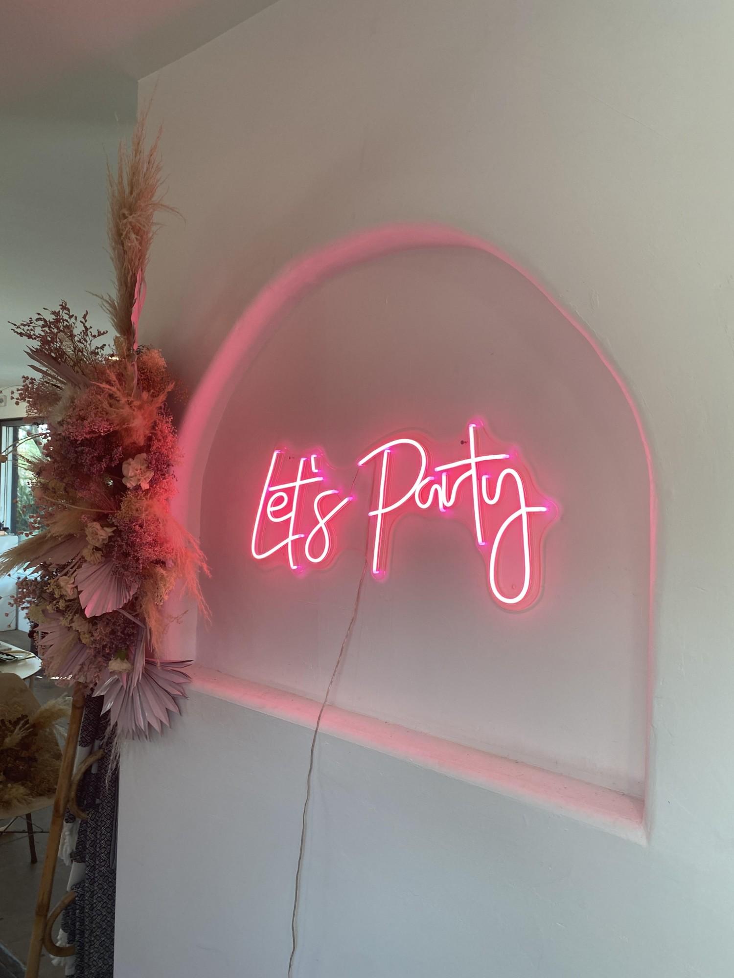  Neon sign “Let’s Party” from a shop inside the MSA Annex located at 267 South Avenida del Convento.