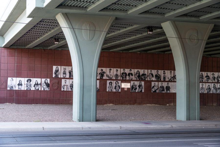 Portraits are pasted to the wall under the I-10 at the Cushing Street intersection. The skatepark portrait series portrays a diverse collection of individuals united by a passion for skating.