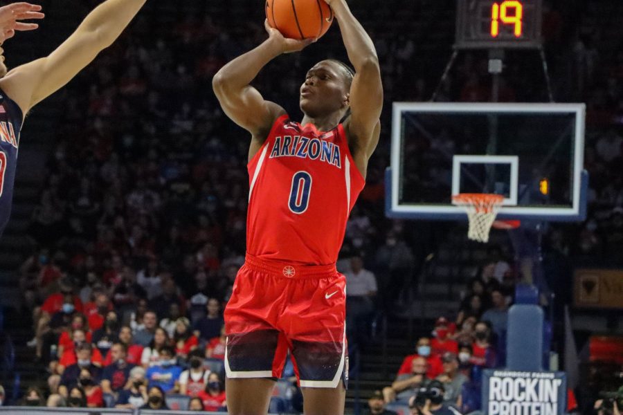 Bennedict Mathurin, a Sophomore on the Arizona mens basketball team, steps back and takes a short jump shot in front of a blue team defender on Oct. 2, in Mckale Center during the Red-Blue game. The blue team went on to win the game.